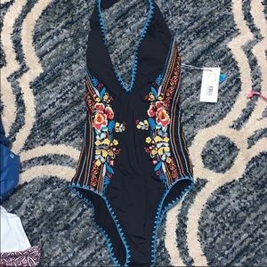 Beautiful Johnny was one piece swimsuit